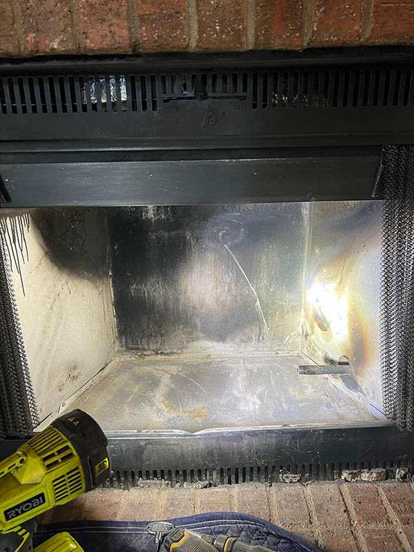 flashlight shining black firebox