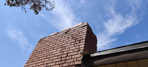 damaged red chimney in duncanville 