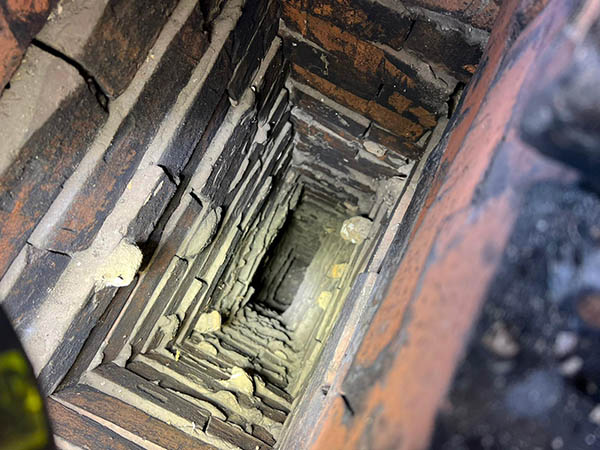 Masonry Chimney being inspected