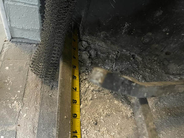 Measuring tape inside firebox