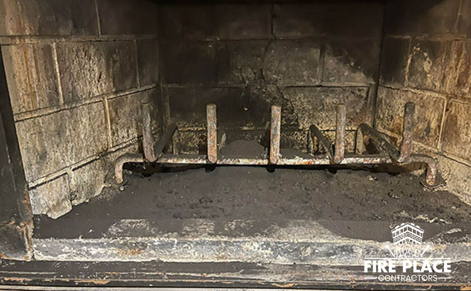 dirty firebox with soot and ash