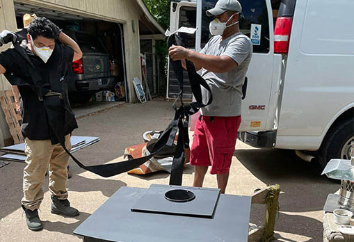 Fireplace contractors making chimney cap